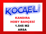 kocaeli kandıra da köy merkezine 300 metre mesafede yol su sorunu olmayan etrafında yerleşim olan 1.545 m2 hobi bahçesi
